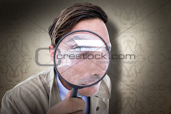 Composite image of spy looking through magnifier