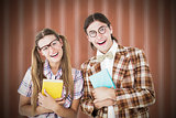 Composite image of geeky hipsters smiling at camera
