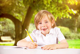 Composite image of cute pupil writing