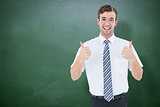 Composite image of happy geeky businessman with thumbs up