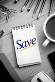 Save against notepad on desk