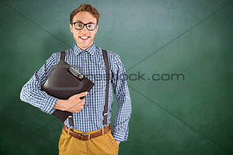 Composite image of geeky businessman holding a clipboard