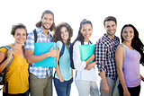 Composite image of smiling group of students standing in a row