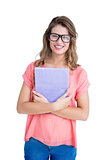 Composite image of pretty geeky hipster holding notepad
