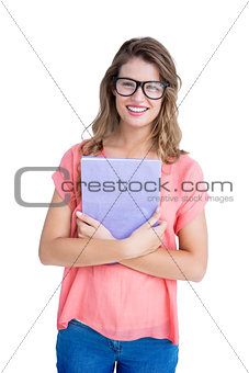 Composite image of pretty geeky hipster holding notepad