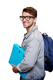 Composite image of student smiling at camera in library
