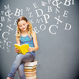 Composite image of cute little girl reading book in library