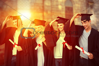 Composite image of group of teenagers celebrating after graduation