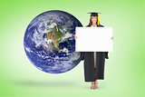 Composite image of full length of a woman holding a blank sheet in front of her as she smiles