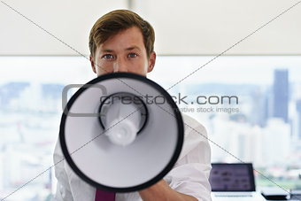 Portrait Confident Business Man With Megaphone In Office