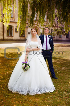 Happy bride and groom at the wedding walk