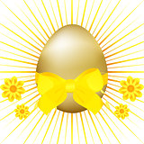Golden Easter egg with ribbon and bow