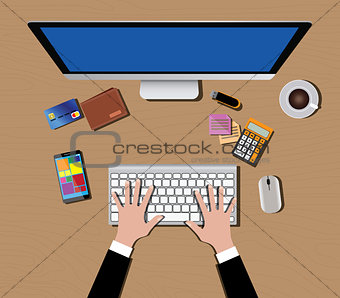 workspace with computer keyboard mouse coffee wallet calculator hand smartphone