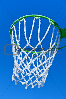 Basketball rim and net with hoarfrost