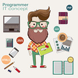 Programmer with a laptop and beard in glasses