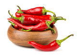 Red hot chili peppers in wooden bowl
