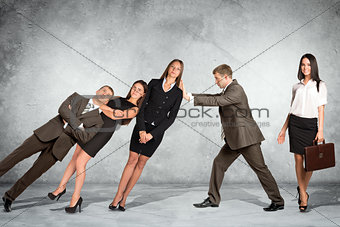 Businessman supporting business people