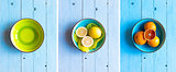 Colorful Orange fruits over a light blue painted wood table