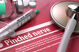 Pinched nerve. Medical Concept on Red Background.