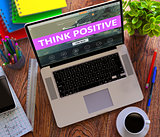 Think Positive Concept on Modern Laptop Screen.