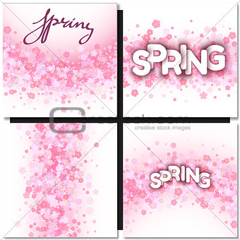 White spring sign over pink flowers background.