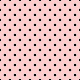 Tile vector pattern with black polka dots on pastel pink background