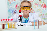 Little girl experimenting in elementary science class