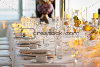 Beautifully decorated table with glass and plate