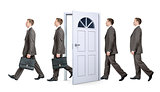Line of businessmen going through door
