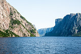 Inland fjord between rugged steep cliffs