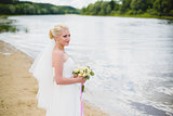 Bride on a background of the river