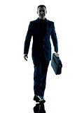 business man walking silhouette isolated