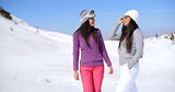Two attractive women friends at a ski resort