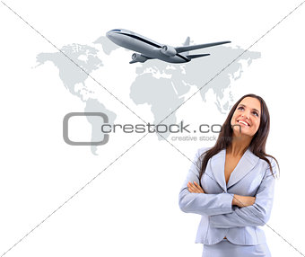 business woman smileeng and looking at airplane