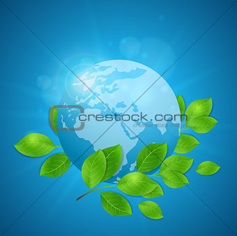 Planet Earth and green leaves