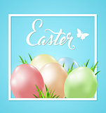 Easter card with eggs and grass