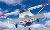 Front of Cessna 172 Single Propeller Airplane In The Sky