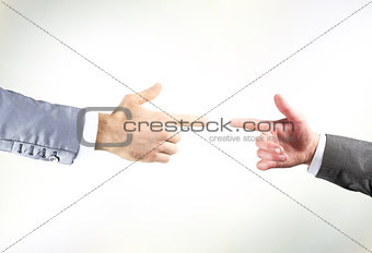 Two hands with fingers tip to tip symbolizing contact