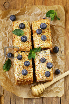 homemade honey cake with blueberries and mint