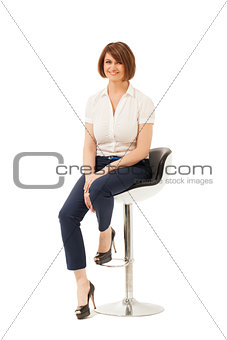 Portrait of smiling businesswoman on chair