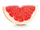 Slice of grapefruit citrus fruit isolated on white