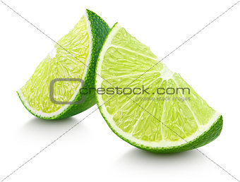 Slices of lime citrus fruit isolated on white