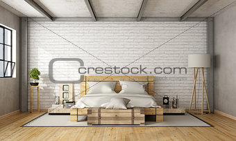 Wooden double bed in loft 