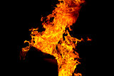 Red fire flame on black background