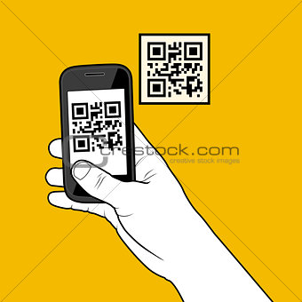 Hand with smartphone taking a QR code