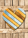 Wooden heart on old wood wall