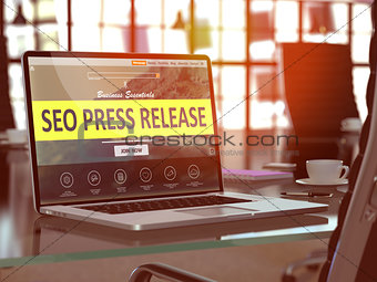 SEO Press Release Concept on Laptop Screen.