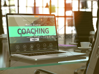 Coaching Concept on Laptop Screen.