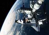 Space Station And Shuttle Orbiting Earth