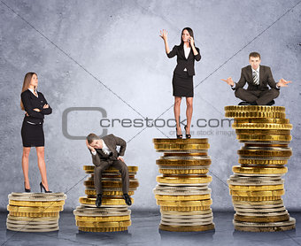 Business people on coins
